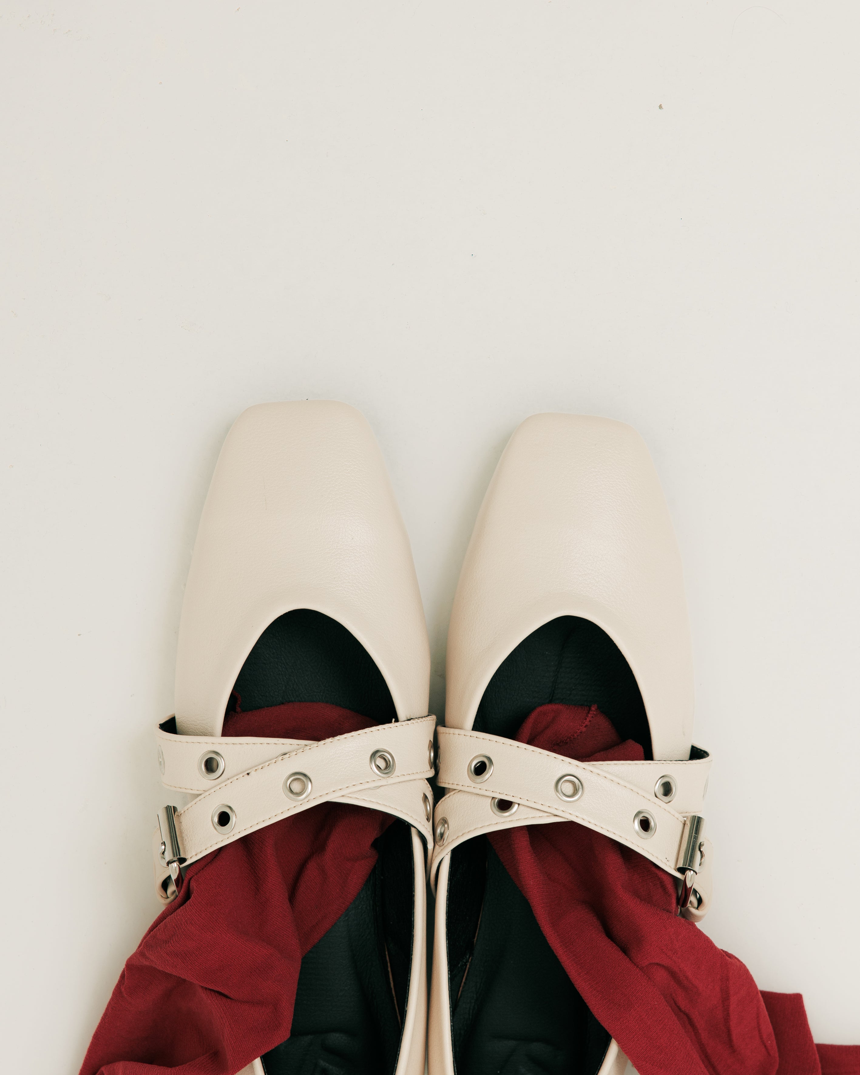 Cross strap beige flats