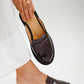 Loafer-style mules in patent maroon